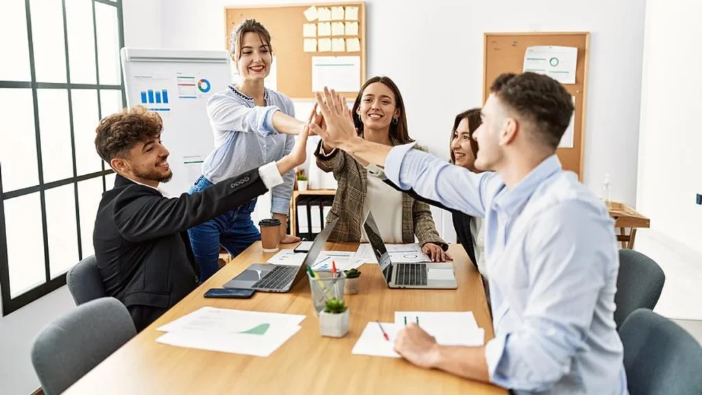 happy employees on a successful team